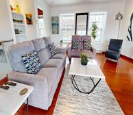 57 Harvey Road - Corporate housing in St. John's spacious living room open to dining room and kitchen - Premiere Suites