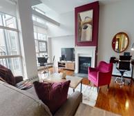 Bishops Landing 1475 - Pet-friendly rental in Halifax living room with workspace office and sofa with tv - Premiere Suites
