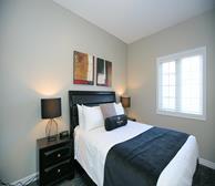 Primary Bedroom Queen Mattress Fully Furnished Apartment Suite Kleinburg 12