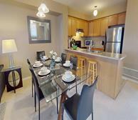 Garden Villas - Mississauga furnished apartment rental fully equipped kitchen and dining room with seating for six - Premiere Suites