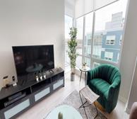 The Killick - Dartmouth furnished apartment rental living room with Halifax harbour views - Premiere Suites King Wharf Pl