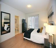Master Bedroom Queen Mattress Fully Furnished Apartment Suite Maple
