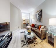Basement entertainment area with new furnishing and workspace