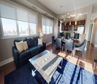 Claridge Plaza 1 - Ottawa short-term rental open-concept living room and dining room - Premiere Suites