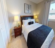 Primary Bedroom King Mattress Fully Furnished Apartment Suite Barrhaven