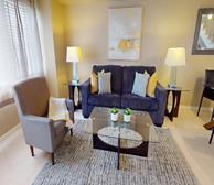 Garden Villas - Mississauga monthly home rental furnished living room open to dining area and fully-equipped kitchen - Premiere Suites